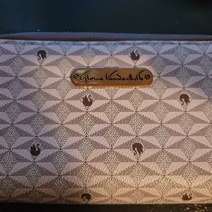 FREE WITH ANY PURCHASE loria Vanderbilt wallet
